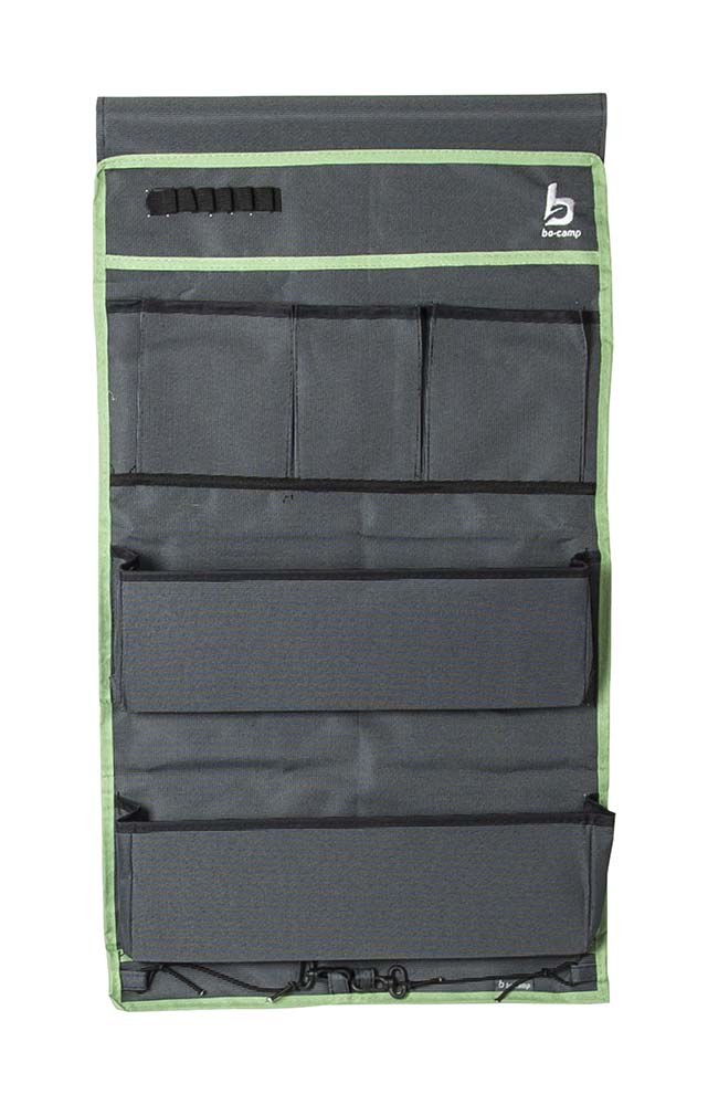 1771520 An extremely strong 7-compartment organiser. Has 2 large and extra sturdy compartments and 4 small compartments. Made from a high quality Two-Tone 600D Oxford Polyester. Simple, and can be mounted in various ways. This pelmet can be hung on a caravan rail with the string, with velcro to the tent pole or with eyelets on hooks. The loops at the bottom provide additional fixation.
